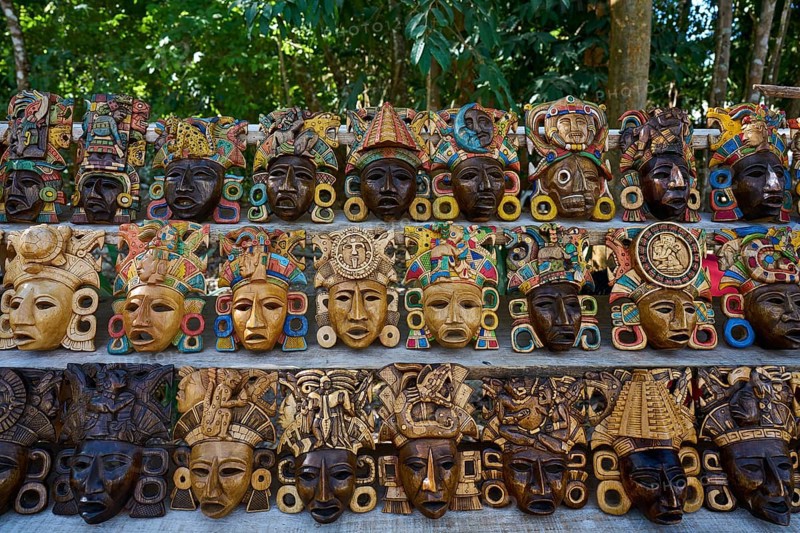 Chichen itza Mayan handcrafted wooden masks in Yucatan Mexico