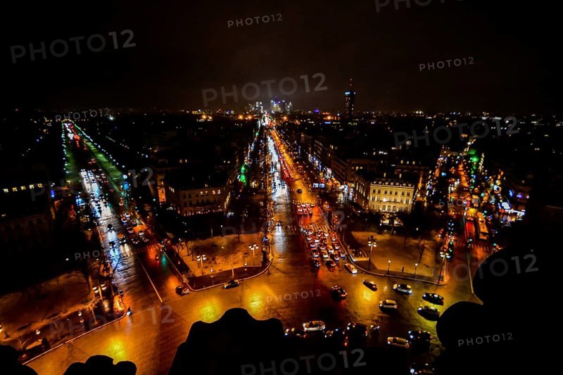 View from Arc de triomphe at night, Photo image a Beautiful panoramic view of Paris Metropolitan City