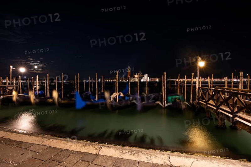 Venetian gondolas, boat dock at St Mark's Square, church of San Giorgio Maggiore in the background, night shot, moon, Venice, Veneto, Italy, Europe