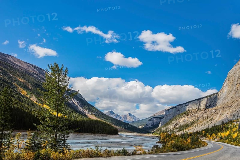 The Bow River Canyon in September. Canadian Rockies, Great Banff. Excellent highway and surrounded by autumnal woods