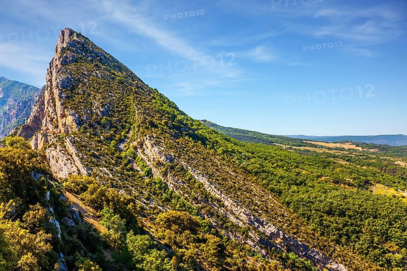 Picturesque cliff in the French Alps. The fascinating journey to the most beautiful canyon in Europe - Verdon. Concept of ecological, extreme and active tourism