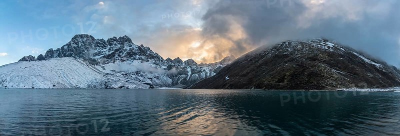 Gokyo lake and mountains at sunset. Dramatic sky. Himalaya, nepal
