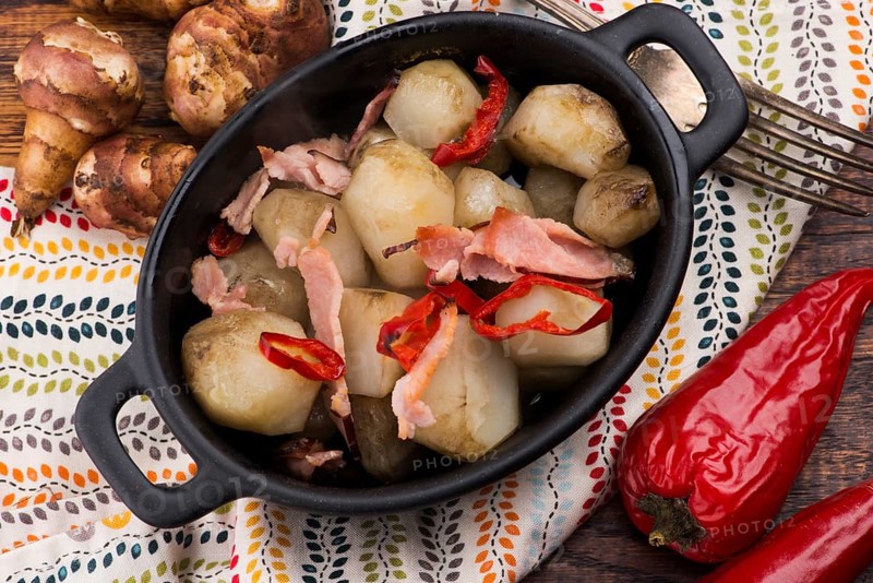 Jerusalem artichoke au gratin with ham and chili. Fricassee, fruits