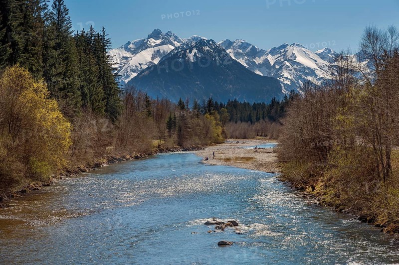 The spring-like Iller with the Oberstdorf Alps in the background in Fischen, Allgäu, Swabia, Bavaria, Germany, Europe