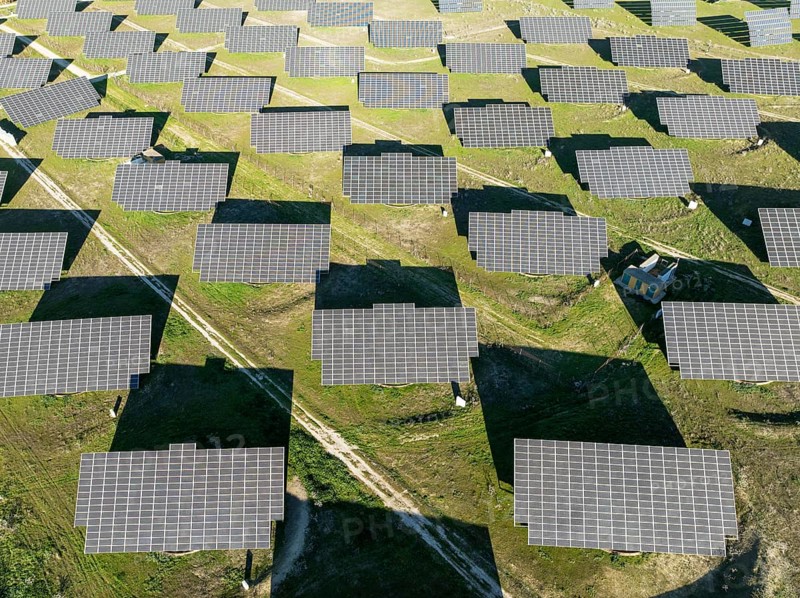 Rows of solar panels at a photovoltaic plant near town of Espejo. Aerial view. Drone shot. Córdoba province, Andalucía, Spain, Europe