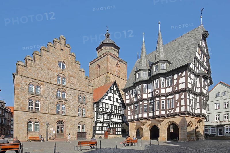 Gothic wine house built in 1539 of the Renaissance, church tower of the and half-timbered town hall built in 1516 with turrets and decorations, church tower of the Walpurgis church, people, pedestrians, market square, Alsfeld, Vogelsberg, Hesse, Germany, Europe