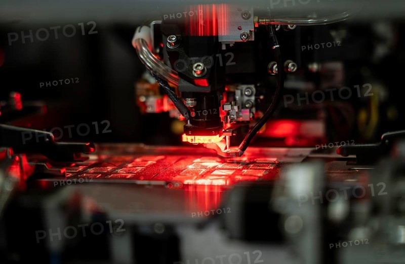 Robotic machine manufacturing semiconductor computer ship at a stall to show investors, during The Advantage Assam 2.0 Investment Summit in Guwahati, India on 25 February 2025