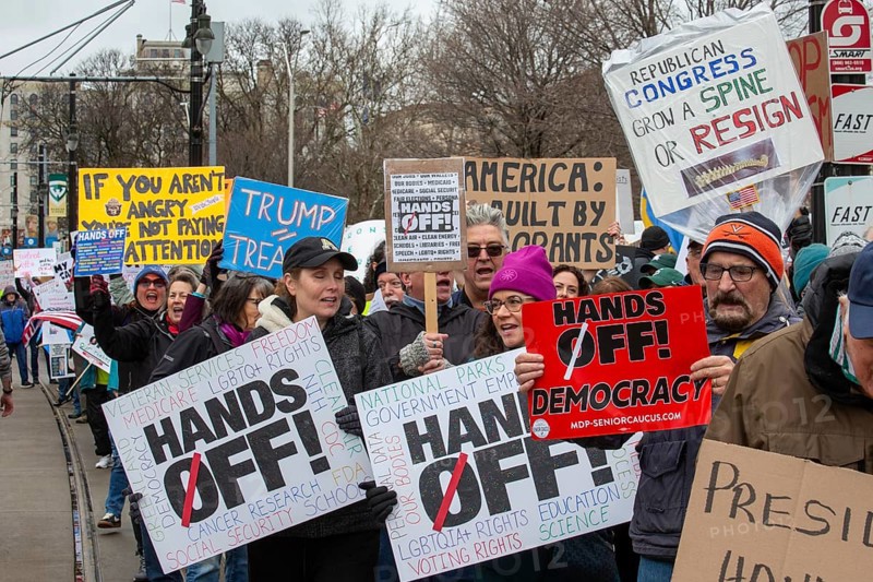 Detroit, Michigan USA - 5 April 2025 - A 'Hands Off' demonstration protests the Trump Administration's cuts to government programs. It was one of hundreds of coordinated protests across the United States