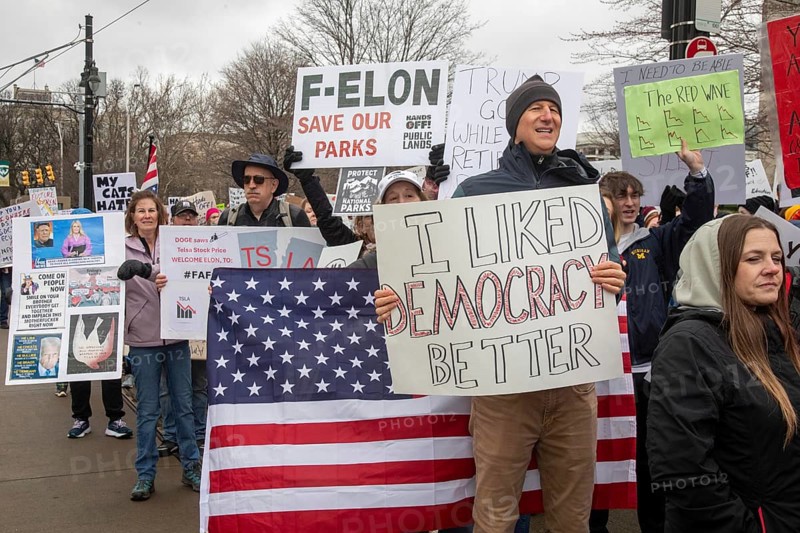 Detroit, Michigan USA - 5 April 2025 - A 'Hands Off' demonstration protests the Trump Administration's cuts to government programs. It was one of hundreds of coordinated protests across the United States