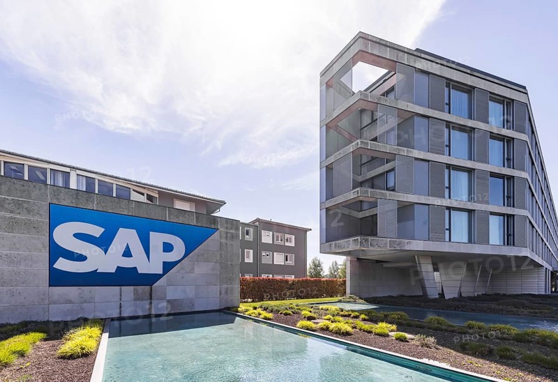 Logo and building of the listed software company SAP, headquarters. Walldorf, Baden-Württemberg, Germany, Europe