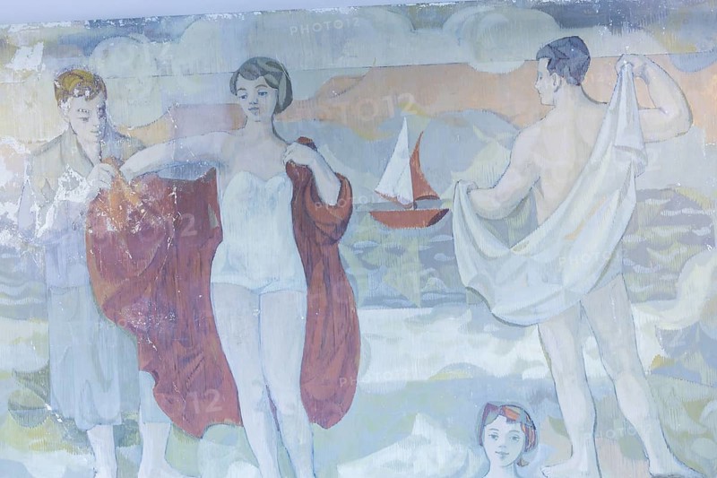 The partial uncovering of the early work in the Deutsches Hygiene-Museum has been completed In the south stairwell foyer of the Deutsches Hygiene-Museum, the large-format mural Lebensfreude (Joy of Life) was created in 1956, with which the then 24-year-old Gerhard Richter completed his studies at the Dresden Academy of Fine Arts. This diploma work, measuring around 63 square metres, was painted over in 1979 and then largely forgotten. After two smaller windows had already been opened in the 1990s, a central section of this historically significant work of art has been uncovered since February 2024 with Gerhard Richter's consent. The result of this complex restoration project can now be viewed. The uncovering was a joint project of the Deutsches Hygiene Museum and the Wüstenrot Foundation in co-operation with the Dresden University of Fine Arts. The accompanying educational measures were supported by the Ernst von Siemens Art Foundation through a