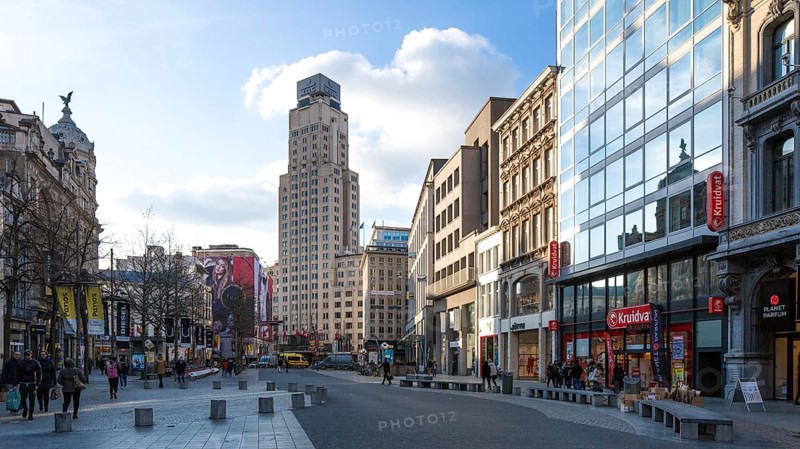 Antwerp, main shopping street Meir behind Boeren Toren tower block (farmer's tower - agricultural bank) built in 1930 by Jan van Hoenacker 97 metres high