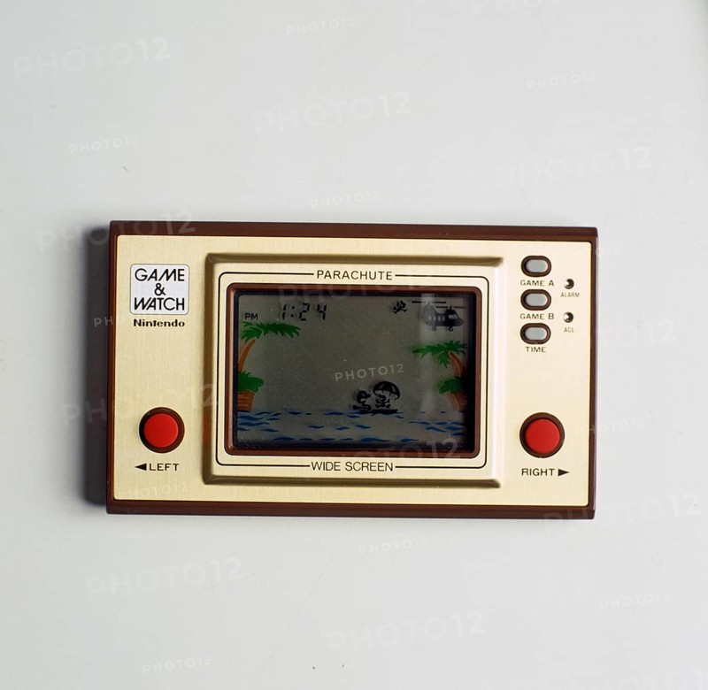 Nintendo Game & Watch. A series of handheld electronic games produced by Nintendo between 1980 to 1991. Pictured the game Parachute witch was launched june 19 1981. Wide screen Nintendo 100 series