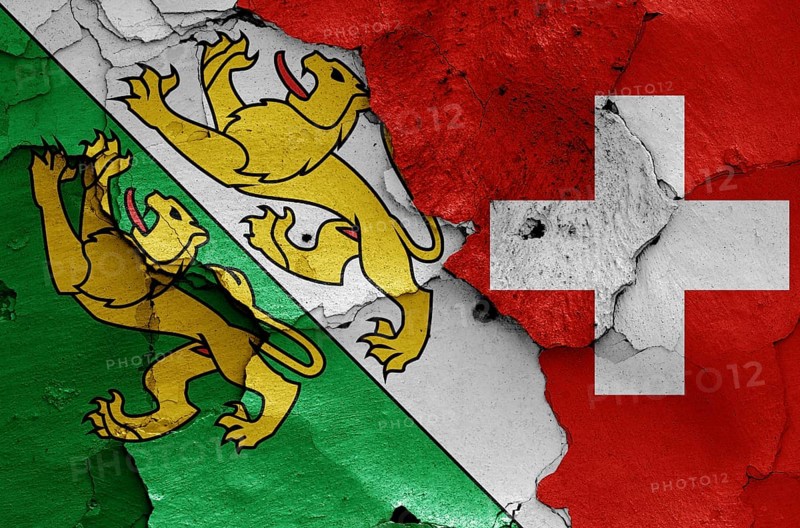 Flags of Thurgau canton and Switzerland painted on cracked wall
