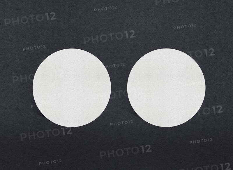 Two white circular papers symmetrically placed on a dark background, Blank white Business card mockup stacks at grey textured paper background