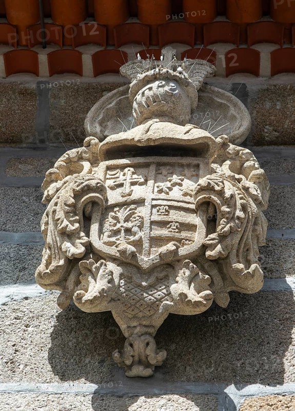 Stonework carving of noble family coat of arms, 15 Rua de Donas, city of Guimaraes, northern Portugal