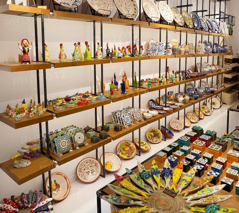 Ceramic pottery gifts display inside tourist souvenir craft shop, Guimaraes, northern Portugal