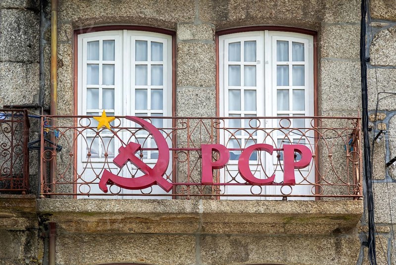 Hammer and sickle sign on PCP Portuguese Communist Party building, city centre Guimaraes. Portugal