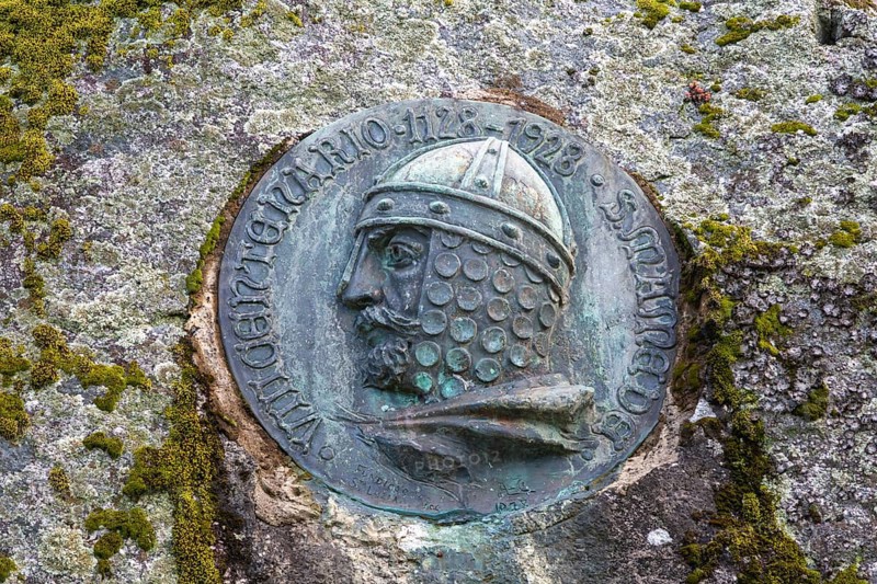 Plague on castle wall of Dom Afonso Henriques 1109-1185 first king of Portugal, Guimaraes, northern Portugal