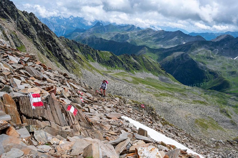Red and white trail markings, hiker in the high mountains, Lasörling High Trail, Lasörling High Trail, Austria, Europe