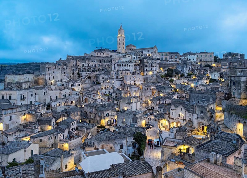 Panoramic View of Sassi di Matera at dusk, Sasso Barisano, Basilicata, Italy, Europe