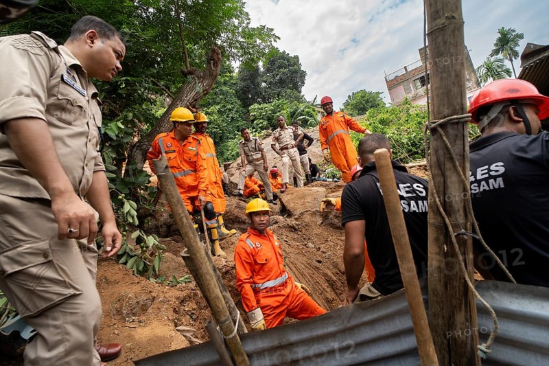 Rescue operations by the National Disaster Response Force (NDRF) and police are in full swing after a major landslide, triggered by a heavy downpour, in Guwahati, India, on June 7, 2025. One person was reported missing in thr landslide and two houses damaged, Asia