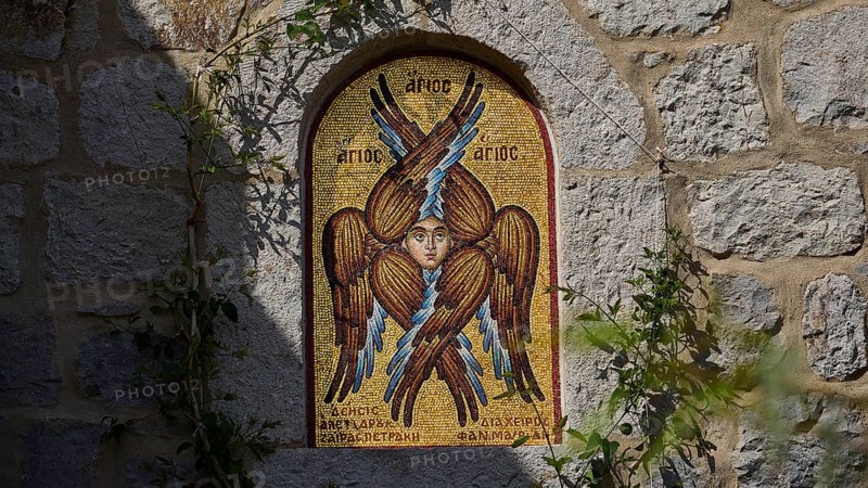 Detailed view of a mosaic with a winged saint on a stone wall, woman's monastery, Evangelismou Monastery, Patmos, Dodecanese, Greek Islands, Greece, Europe