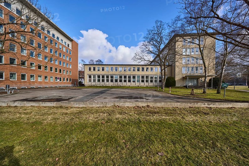 Lower Saxony Ministry for Social Affairs, Labour, Health and Equality, tax office Hannover-Mitte, brick building, bare winter trees, lawn, blue sky, cumulus clouds, Hanover, state capital, Hanover region, Lower Saxony, Germany, Europe