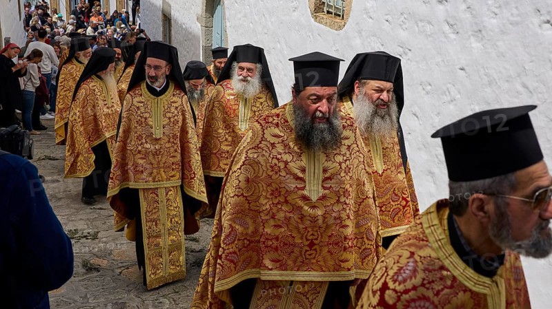 A group of priests in traditional gold and red robes walk during a procession, Orthodox ceremony, monks of St John's Monastery, ceremonial washing of feet, procession, Maundy Thursday, Megali Pempti, Chora, Patmos, Dodecanese, Greek Islands, Greece, Europe