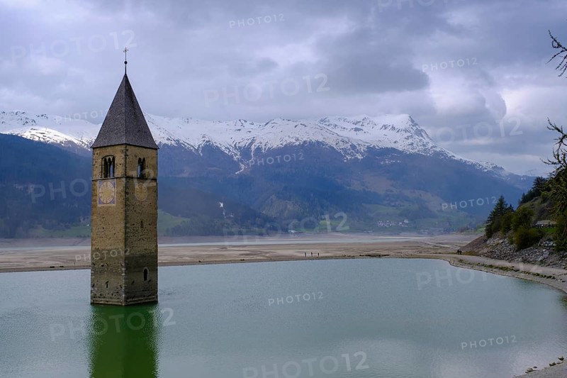 Bad weather at the church tower of Altgraun in Reschensee, Reschenpass, Vinschgau, South Tyrol, Italy, Europe