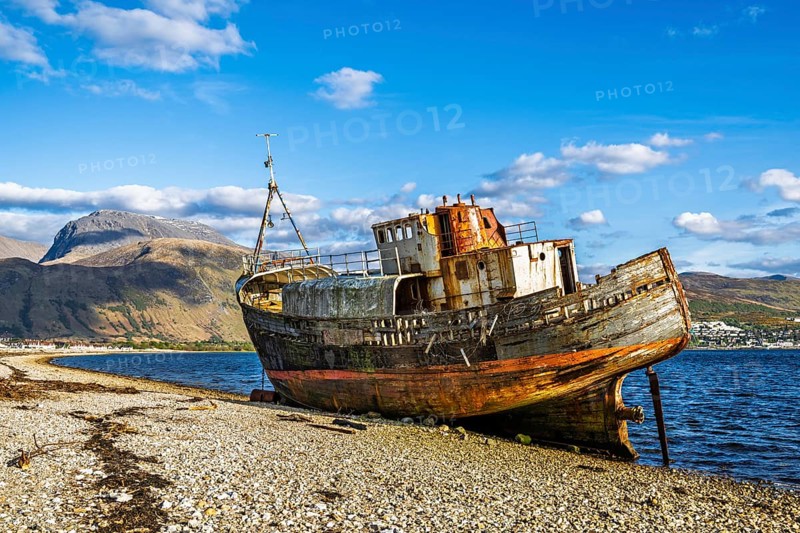 Corpach Wreck or Old Boat of Caol and Nevis Range Mountains, Caol Beach, Corpach, Fort William, Highland, Scotland, UK
