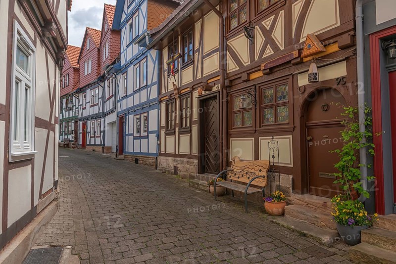 Bad Sooden, Allendorf, Allendorf district, historic old town with numerous half-timbered houses under monument protection, gabled houses, play street sign, bench with musical notes, flower pot, cobblestones, Werra-Meissner district, Hesse, Germany, Europe