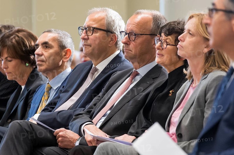 Ugur Sahin (founder of Biontech SE), Andreas Voßkuhle (President of the Senate of the German National Foundation), Friedrich Merz (Chancellor of the Federal Republic of Germany) and Özlem Türeci (founder of Biontech SE) at the award ceremony for the German National Prize 2025 in the Französische Friedrichstadtkirche, Berlin, on 10 June 2025