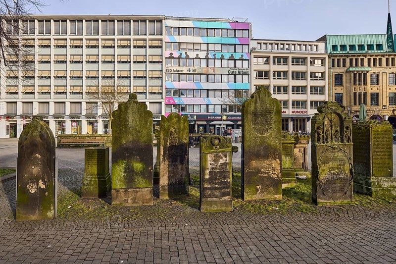 Historic gravestones, general architecture, diffuse light, pale blue cloudy sky, slightly sunny, Goseriede street, Hanover, state capital, Hanover region, Lower Saxony, Germany, Europe