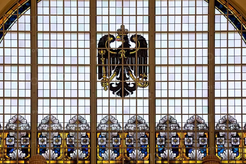 A stained glass window in the railway station with an imperial eagle is a reminder of the imperial era of Wilhelm II in Bad Homburg vor der Höhe, Hesse, Germany, Europe
