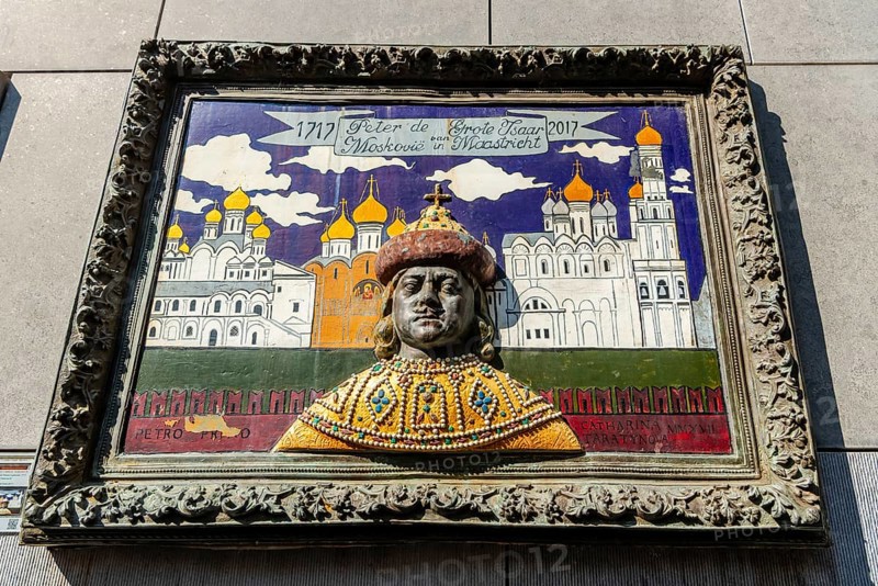 Maastricht, Netherlands, An artistic relief of Peter the Great against a backdrop of Russian cathedrals