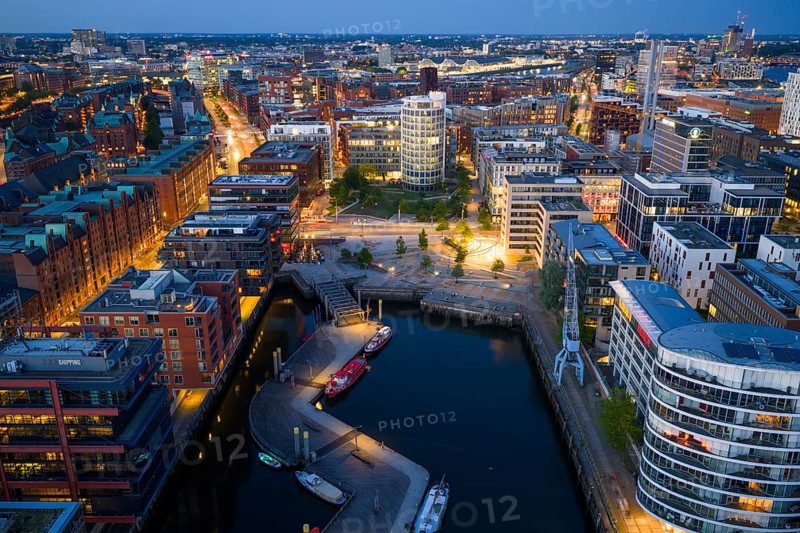 Aerial view of the Speicherstadt Hamburg with Magellan Terraces at Sandtor harbour at blue hour, Hamburg, Germany, Europe