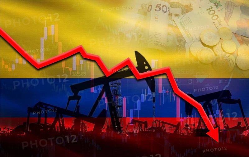 Petrol crisis with Colombia flag on financial graph. Fall oil price with flag of Colombia on economic chart