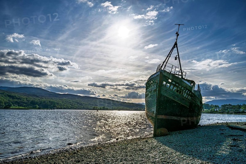 Corpach Wreck or Old Boat of Caol and Nevis Range Mountains, Caol Beach, Corpach, Fort William, Highland, Scotland, UK