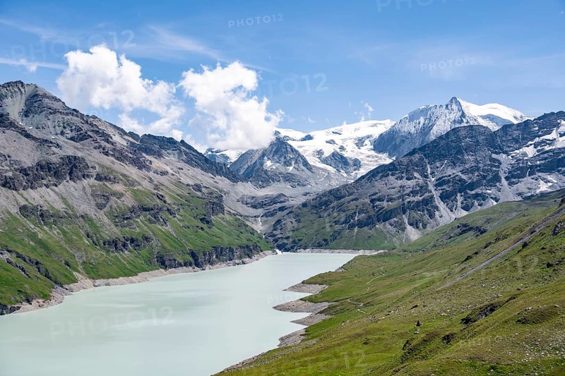 Blue mountain lake in a mountain landscape with glaciers, Lac des Dix reservoir and Mont Blanc de Cheilon peak, Valais Alps, Valais, Switzerland, Europe