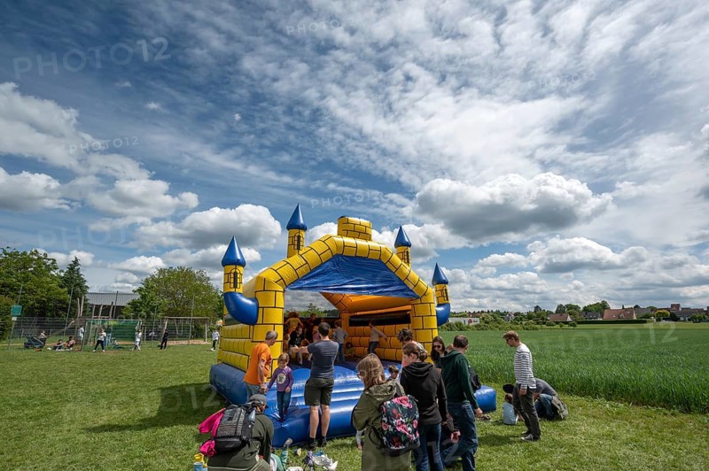 Children's fun, bouncy castle and football games in a meadow during the baking oven festival, Kleingeschaidt, Middle Franconia, Bavaria, Germany, Europe