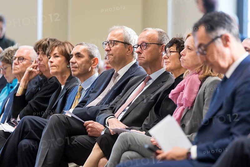 Ugur Sahin (founder of Biontech SE), Andreas Voßkuhle (President of the Senate of the German National Foundation), Friedrich Merz (Chancellor of the Federal Republic of Germany) and Özlem Türeci (founder of Biontech SE) at the award ceremony for the German National Prize 2025 in the Französische Friedrichstadtkirche, Berlin, on 10 June 2025
