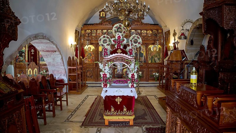 Epitaphios, Church of Agios Ioannis Prodromos, Magnificently decorated orthodox church interior with icons and floral decoration, Skala, harbour, Patmos, Dodecanese, Greek Islands, Greece, Europe