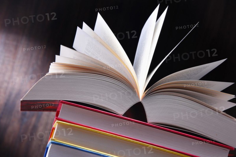 Composition with open book on the table