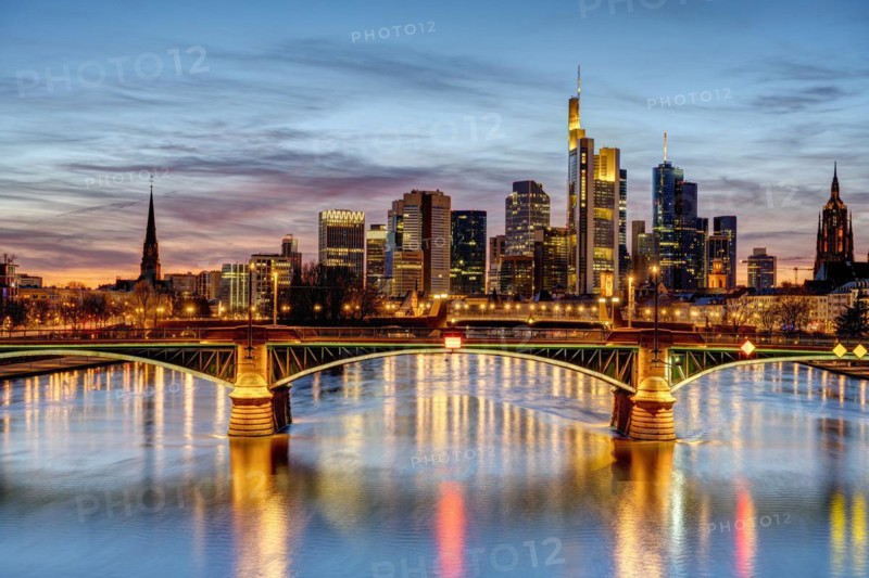 Dramatic sunset over Frankfurt's city centre and the River Main
