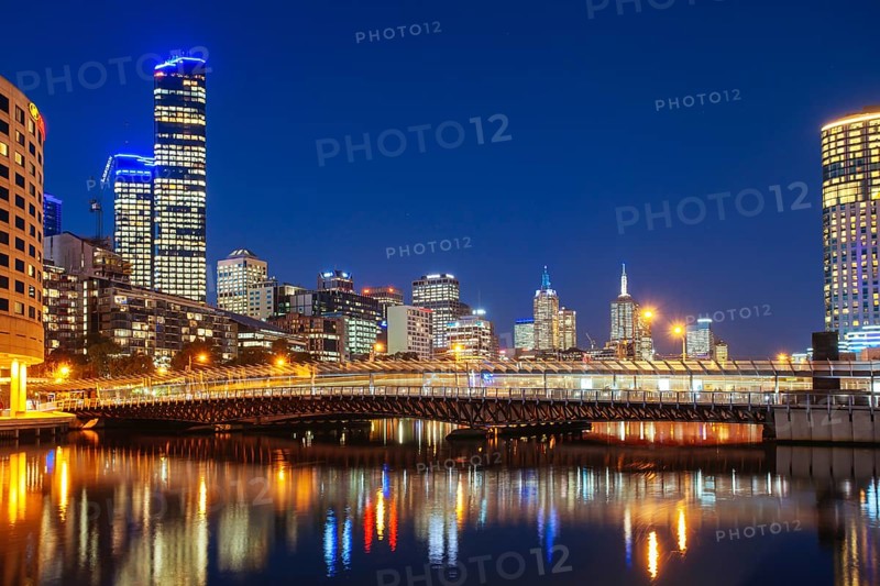 MELBOURNE, AUSTRALIA, JUNE 26 2013, Melbourne's famous skyline along Southbank. Spencer St Bridge and Crown Casino can be seen in Victoria Australia