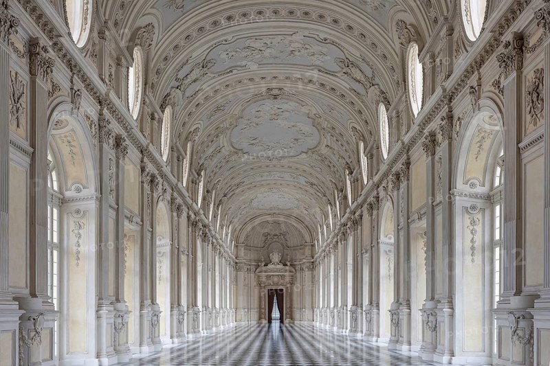 Elongated, elegant Baroque corridor with marble decorations, Palace of Venaria Reale, Residences of the House of Savoy, Turin, Piedmont, Italy, Europe