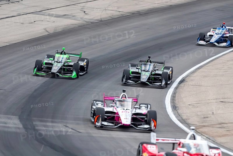 NTT INDYCAR SERIES driver, ROMAIN GROSJEAN (77) of Geneva, Switzerland races through the turns during the Hy-Vee One Step 250 at Iowa Speedway in Newton, IA