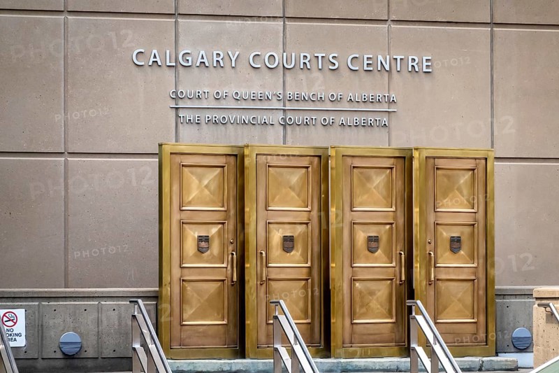 Calgary, Alberta, Canada. Jun 4, 2023. Calgary Courts Centre. The doors were intended to symbolize the passage into a building wherein Justice would be dispensed in accordance with the Rule of Law