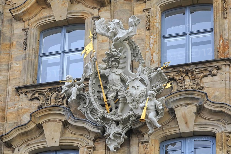 Knight with spear and angels with trumpets statues in Bamberg, Germany, Europe